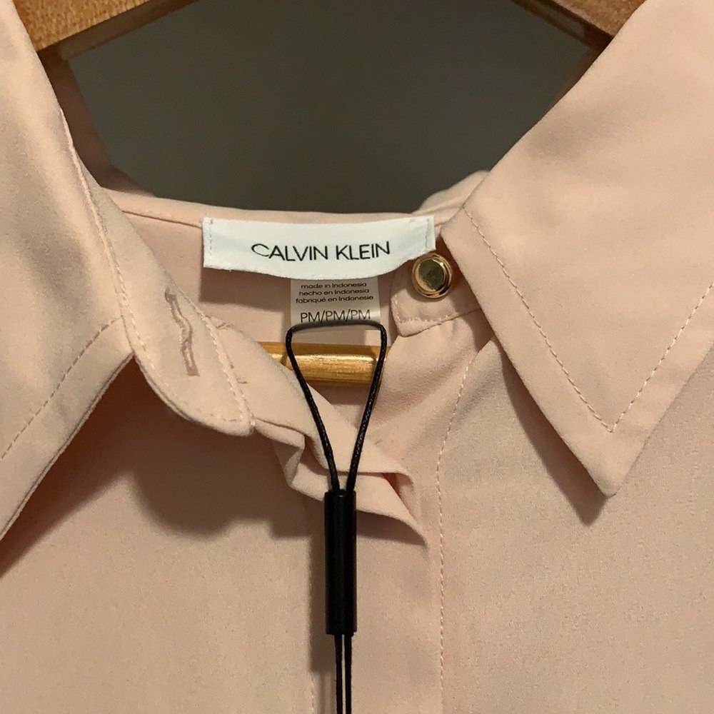 Calvin Klein button up light pink shirt. - Picture 3 of 5